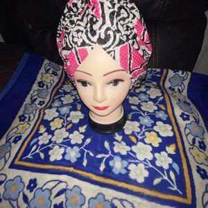 Gorgeous pink, black and white styled head scarf.